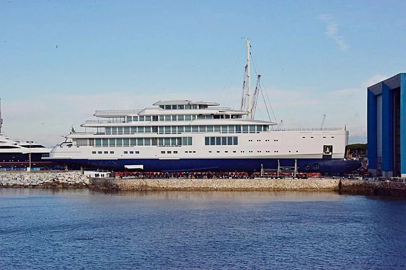 a large cruise ship docked aboard LUMINOSITY Yacht for Sale