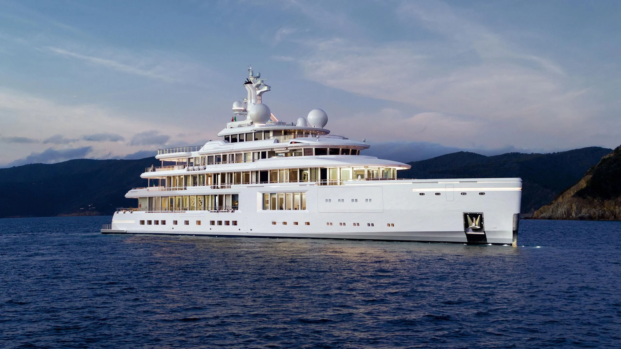 a large white yacht aboard LUMINOSITY Yacht for Sale