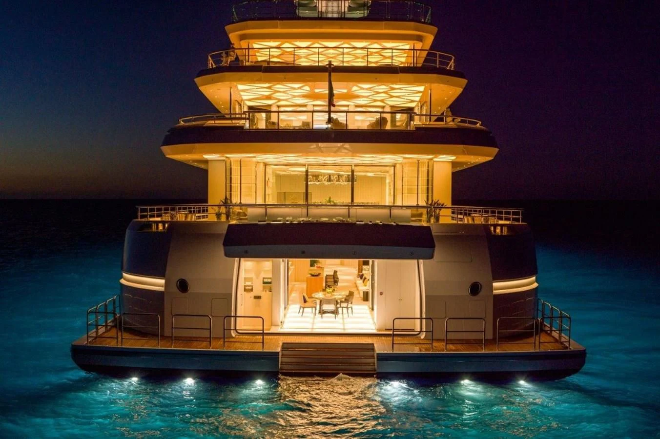 a large cruise ship in the water aboard LUMINOSITY Yacht for Sale
