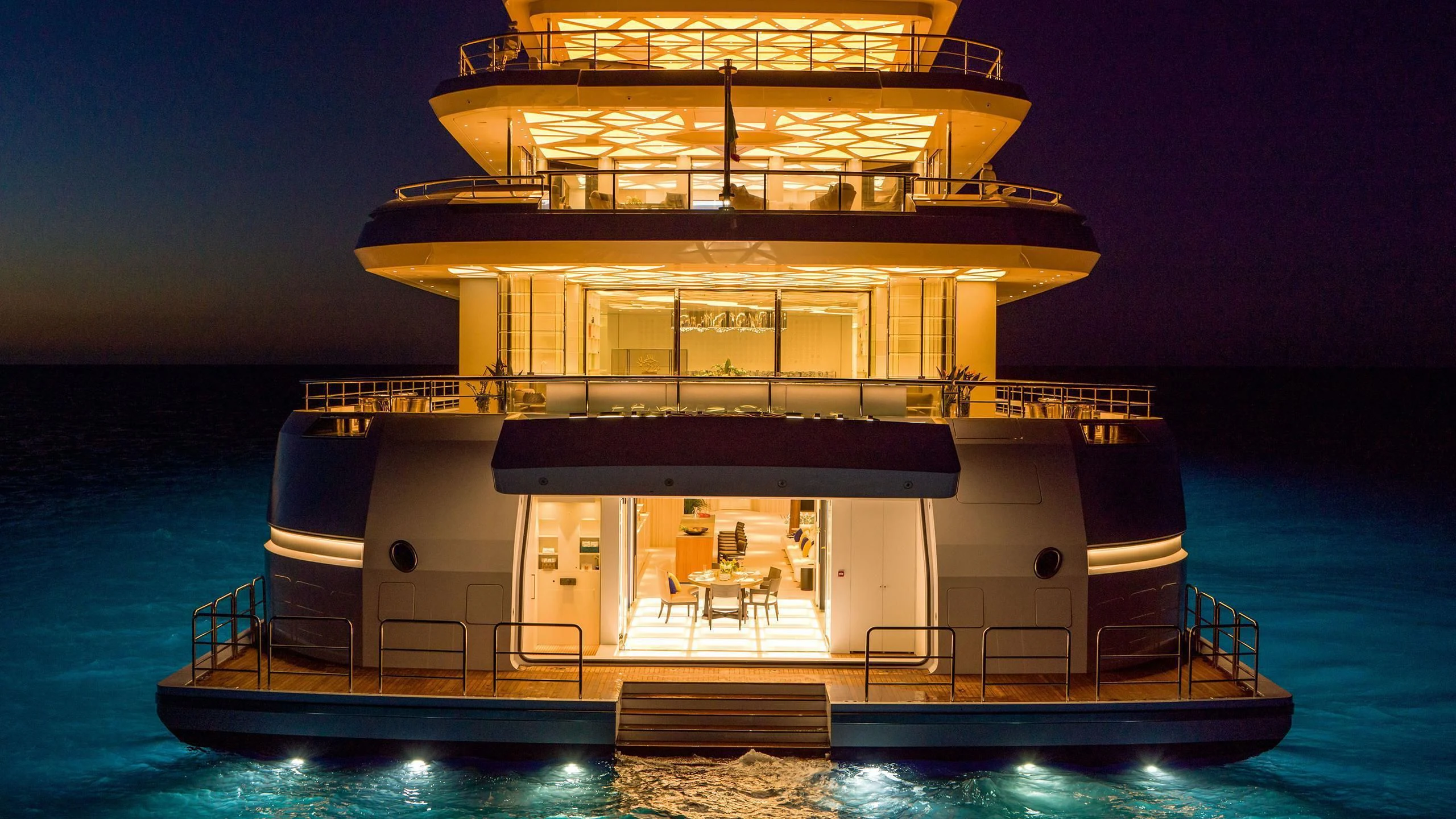 a large cruise ship in the water aboard LUMINOSITY Yacht for Sale