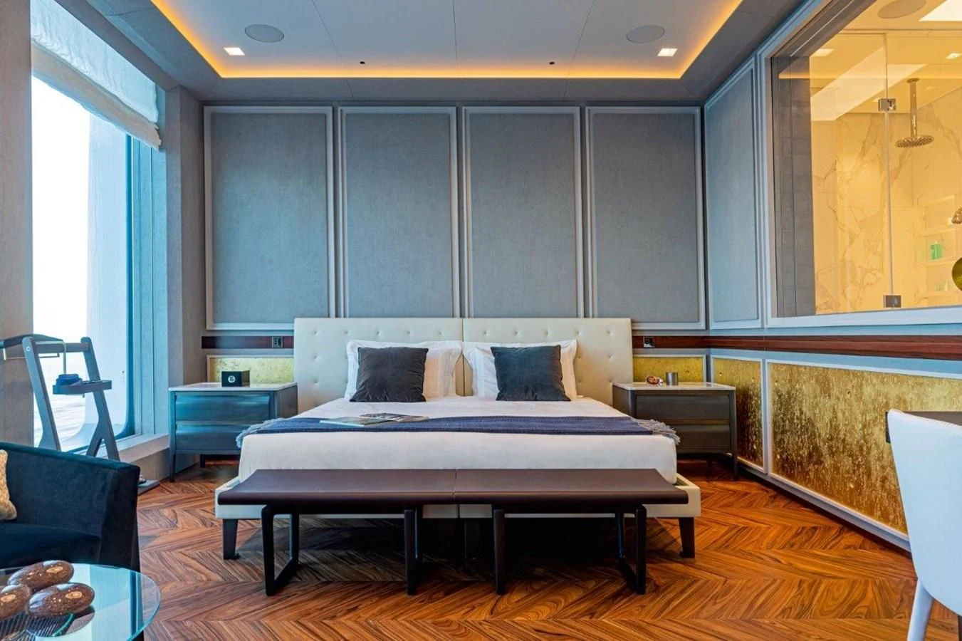 a bed in a room aboard LUMINOSITY Yacht for Sale