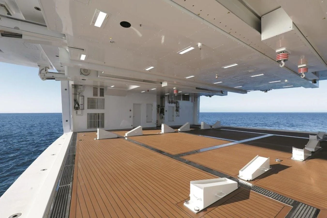a deck with a pool and a deck with a deck and a deck aboard LUMINOSITY Yacht for Sale