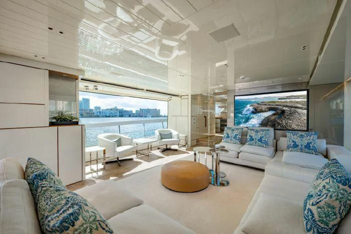 a living room with a large window aboard ABOUT TIME Yacht for Sale