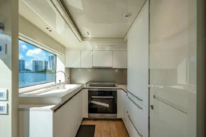a kitchen with a stove and a sink aboard ABOUT TIME Yacht for Sale