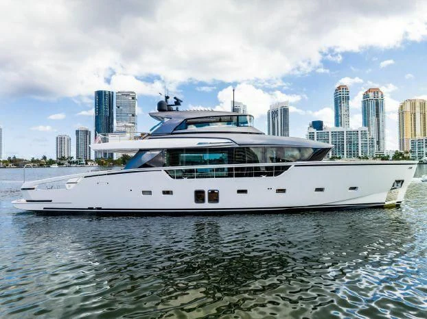 a white boat on water aboard ABOUT TIME Yacht for Sale