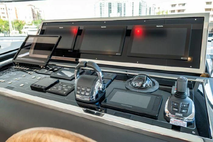 a car with a radio and other electronic devices in it aboard ABOUT TIME Yacht for Sale