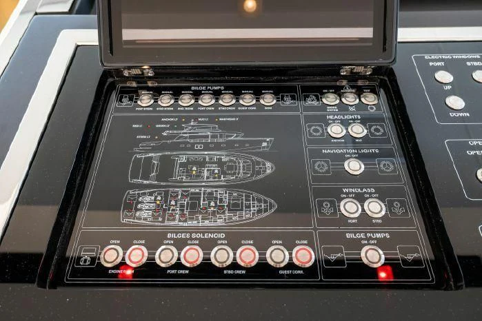 a black electronic device aboard ABOUT TIME Yacht for Sale