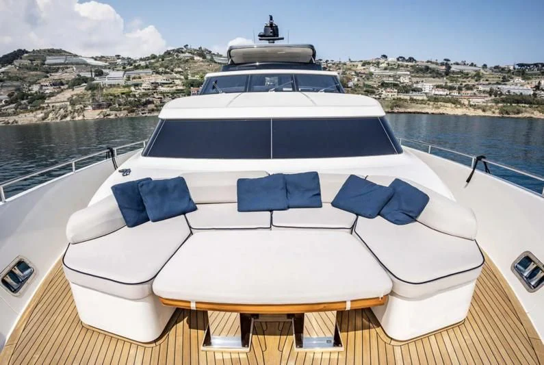 a boat on a deck aboard AMAN Yacht for Sale
