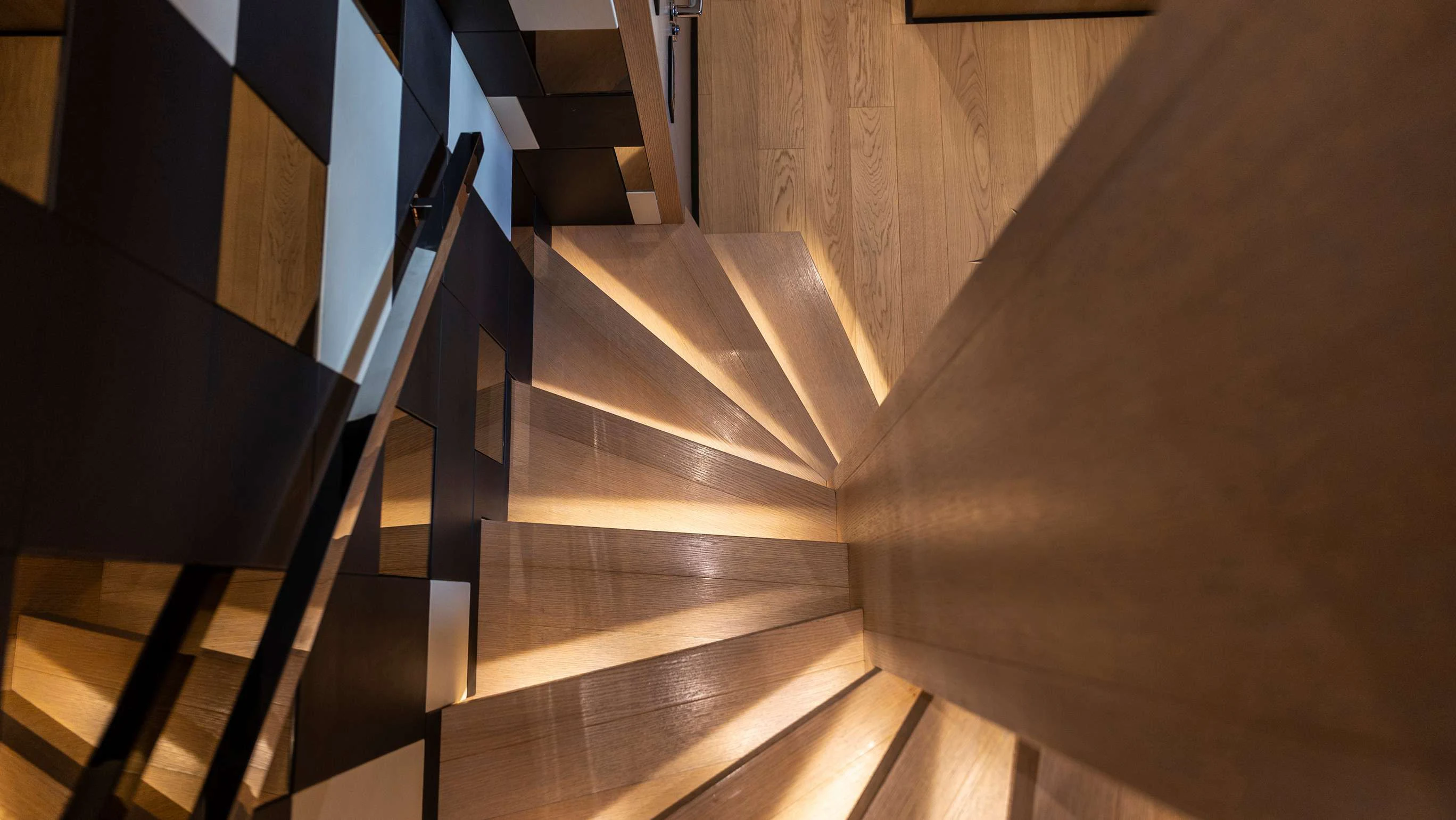 a set of stairs in a room aboard AMAN Yacht for Sale