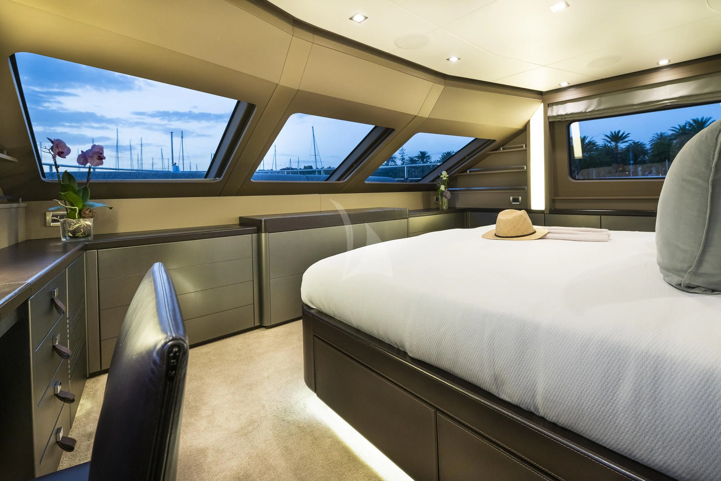a room with a bed and a desk aboard ORSO 3 Yacht for Sale
