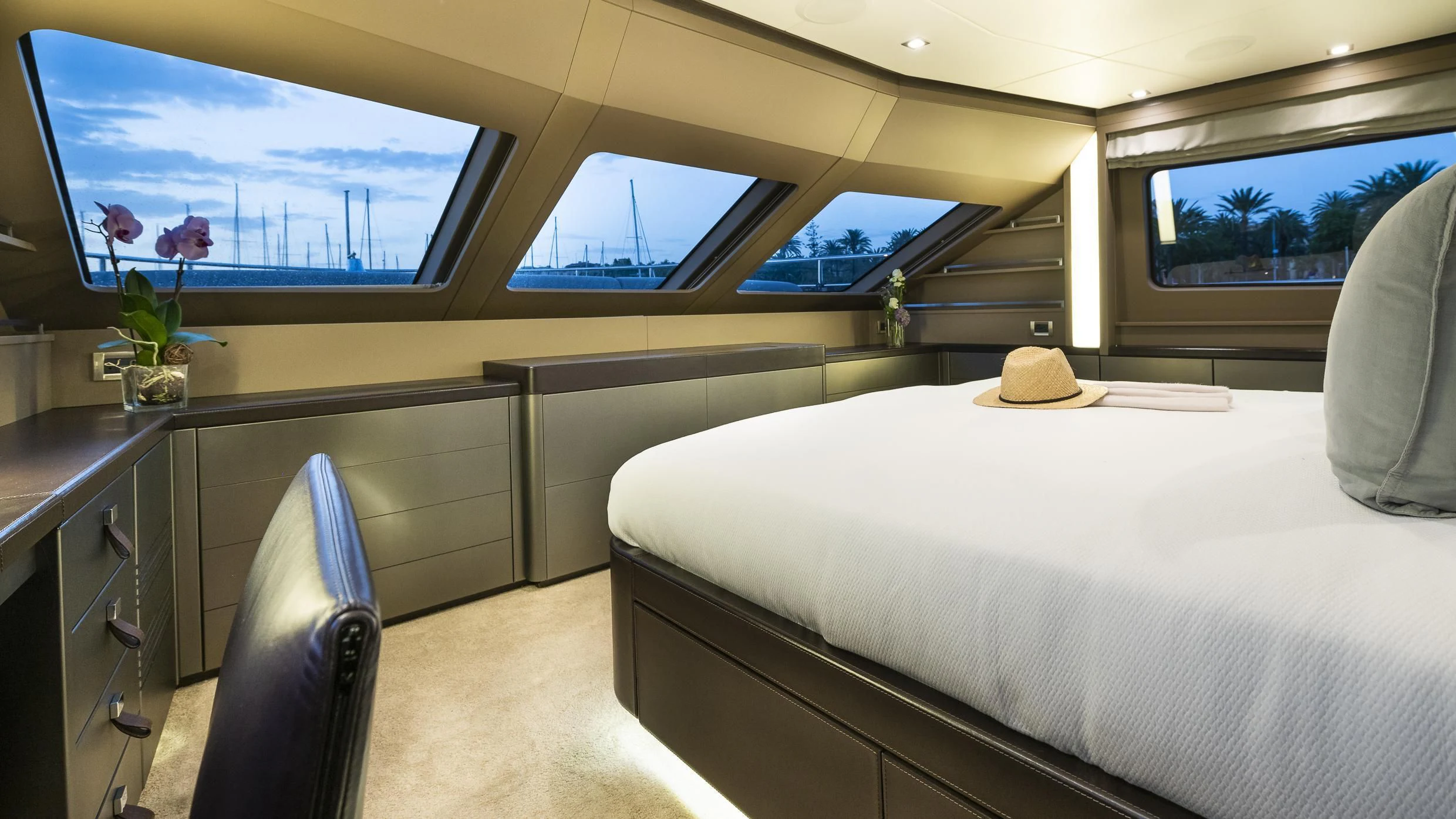 a room with a bed and a desk aboard ORSO 3 Yacht for Sale