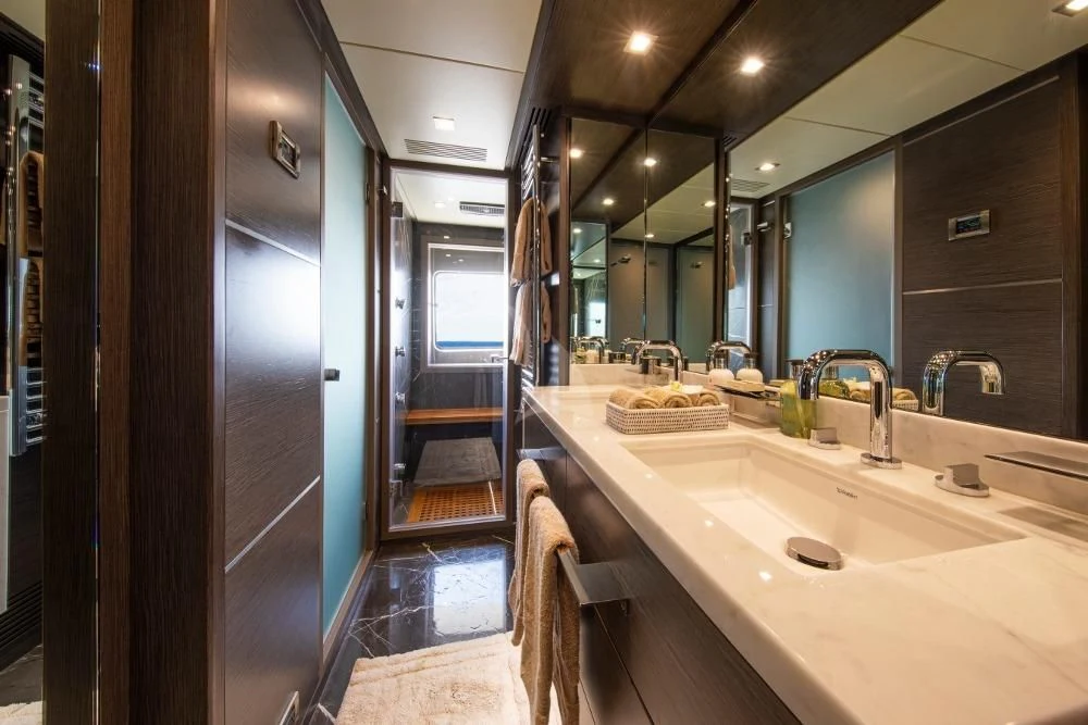 a bathroom with a sink and a mirror aboard ORSO 3 Yacht for Sale