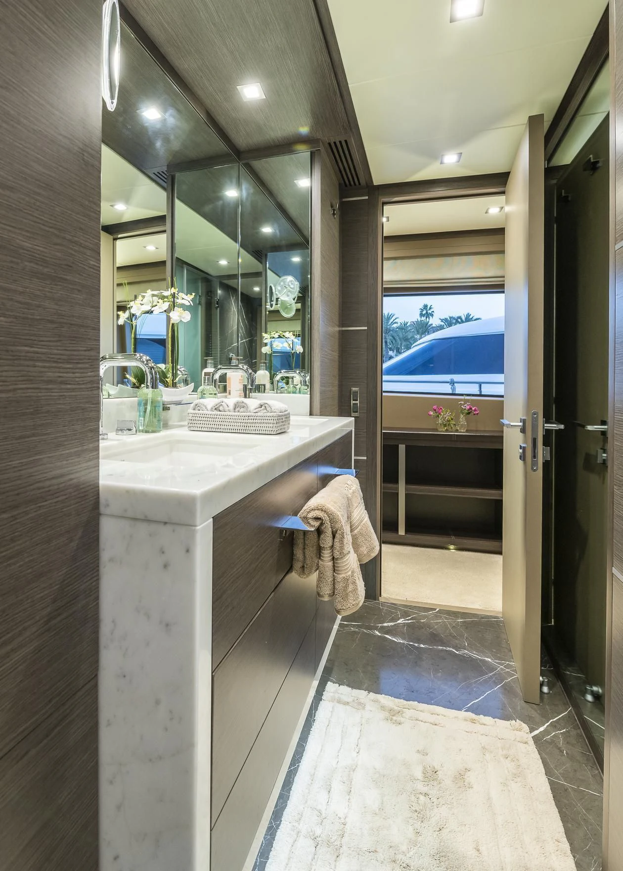 a bathroom with a large mirror aboard ORSO 3 Yacht for Sale