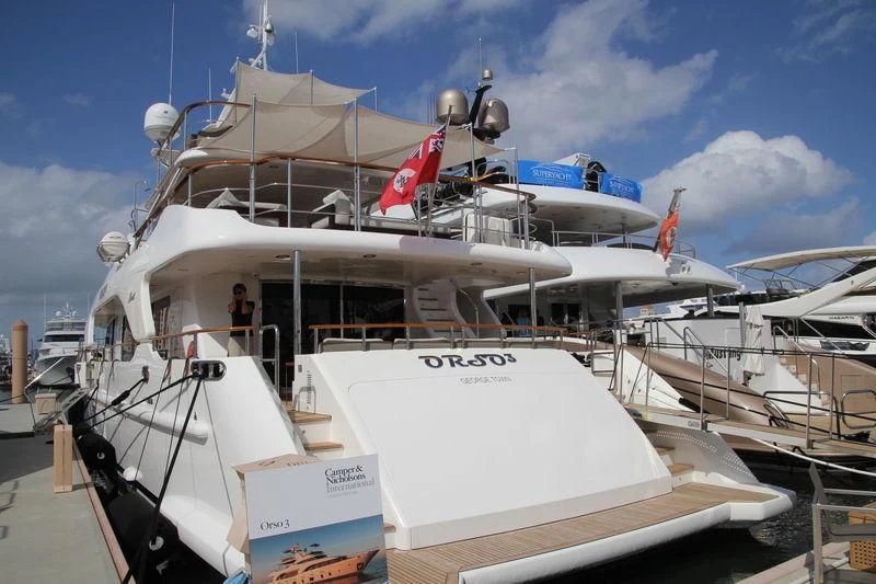 a boat with a flag on the front aboard ORSO 3 Yacht for Sale