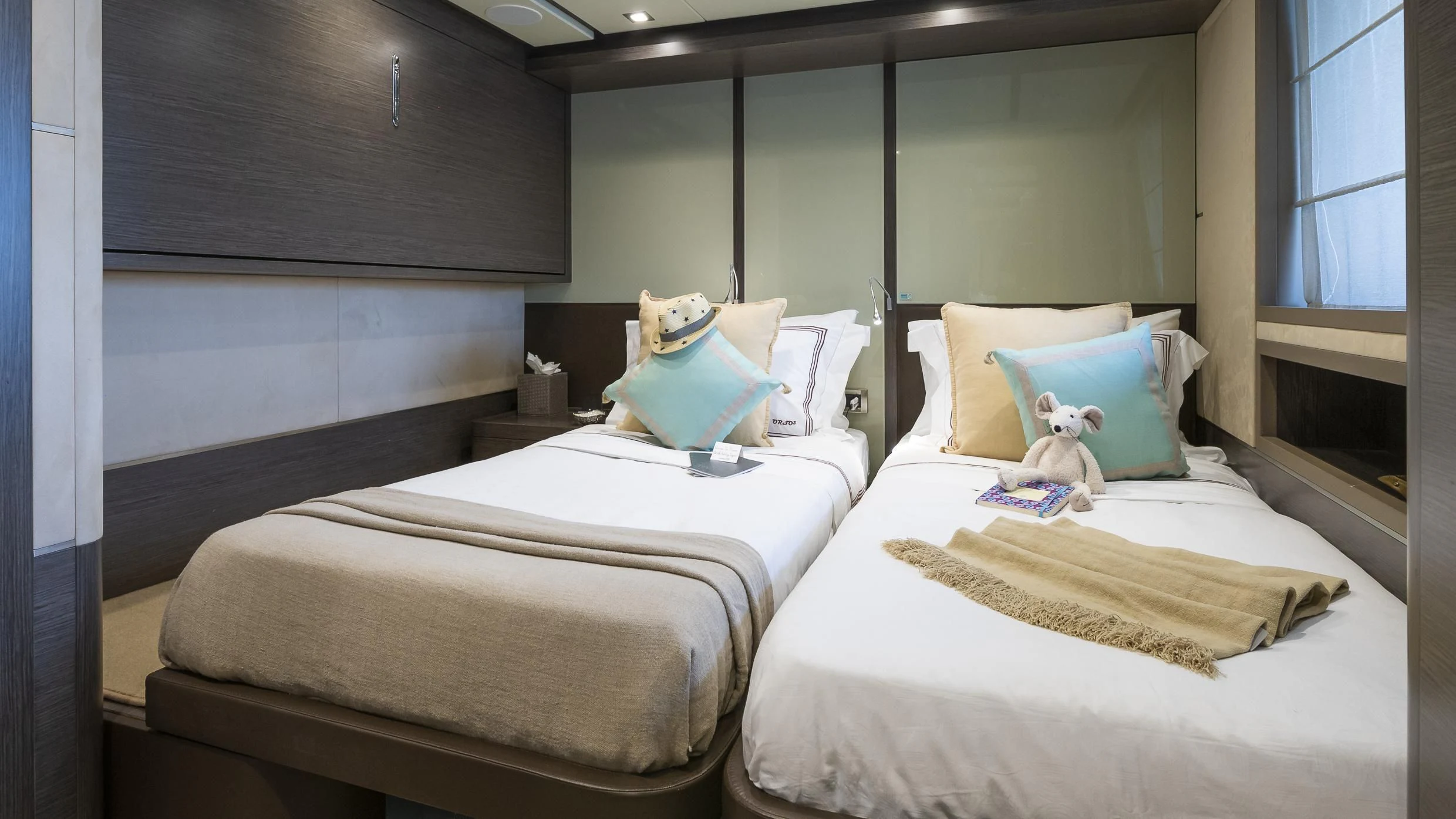 a couple of beds in a room aboard ORSO 3 Yacht for Sale