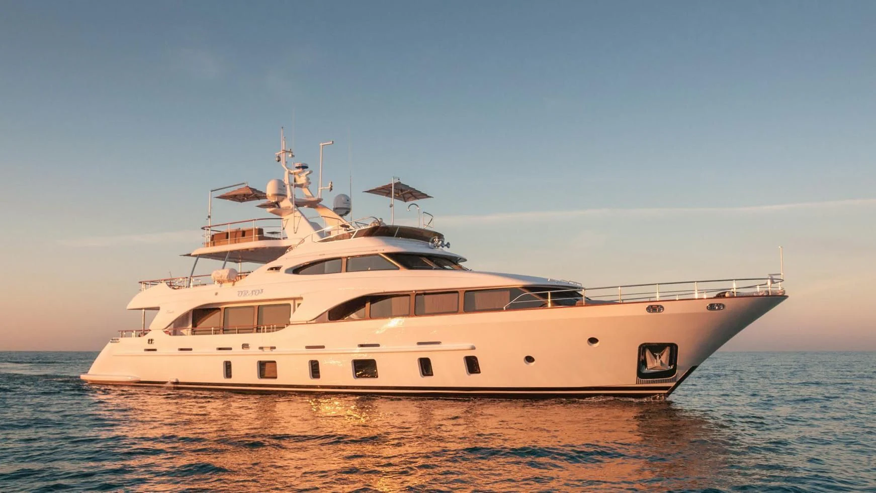 a white yacht on the water aboard ORSO 3 Yacht for Sale