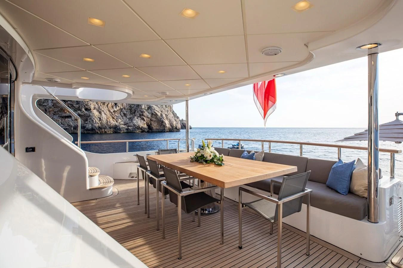 a table and chairs on a boat aboard ORSO 3 Yacht for Sale
