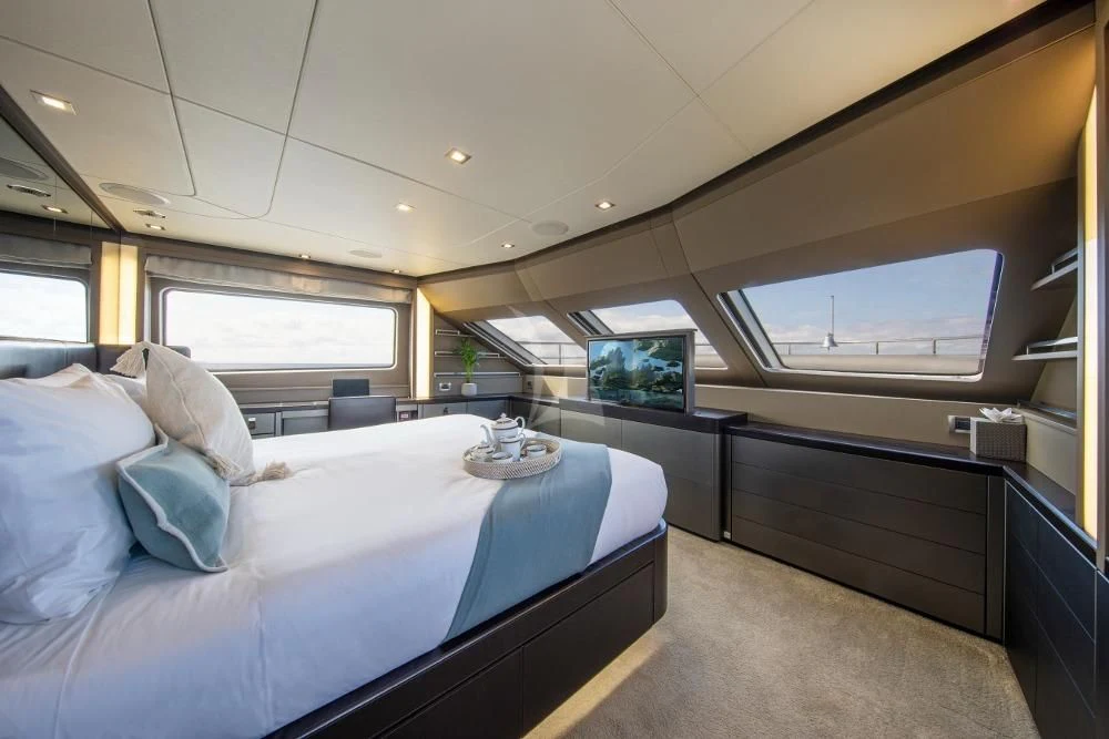 a room with two beds aboard ORSO 3 Yacht for Sale