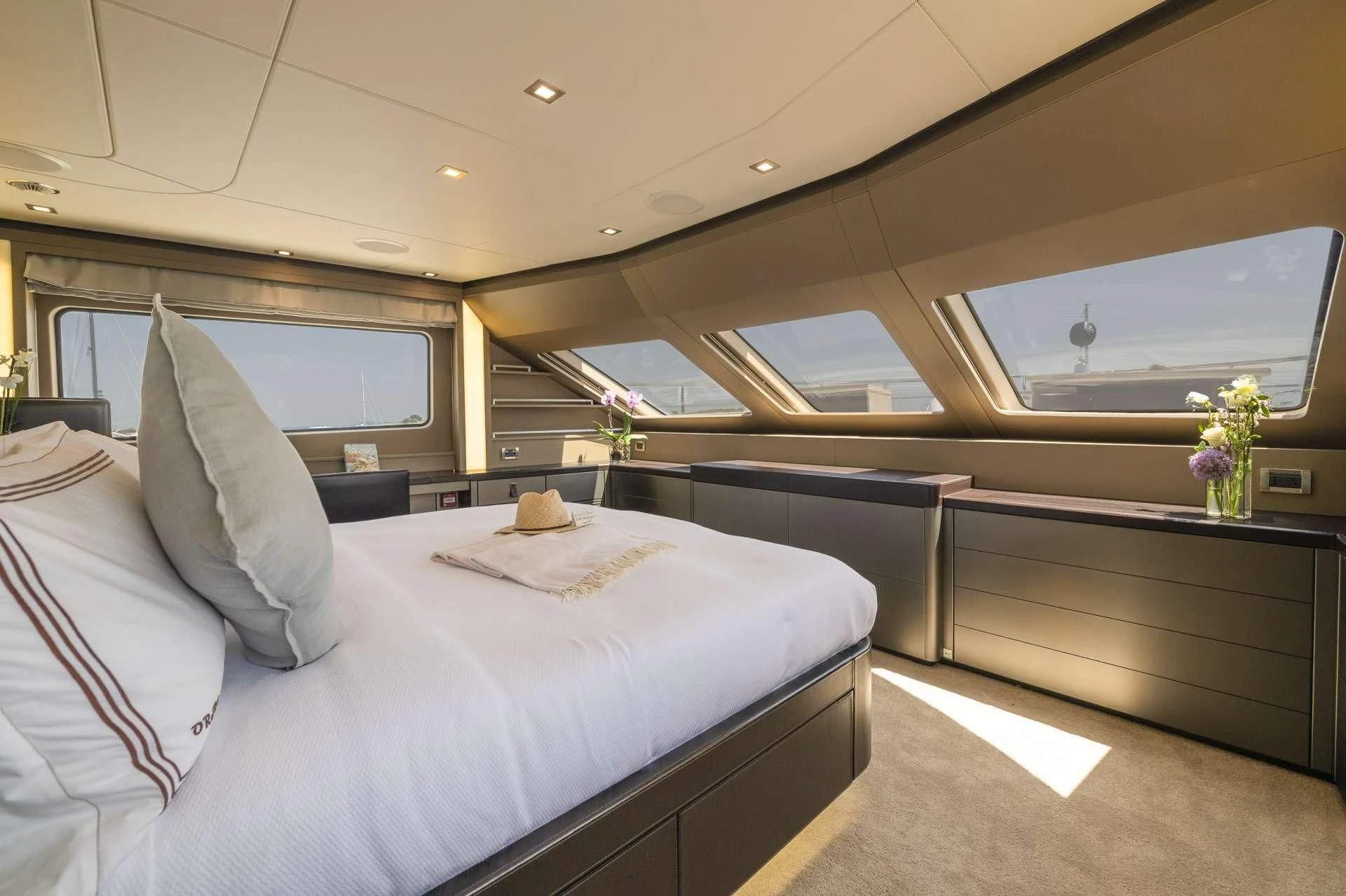 a room with a bed and a window aboard ORSO 3 Yacht for Sale