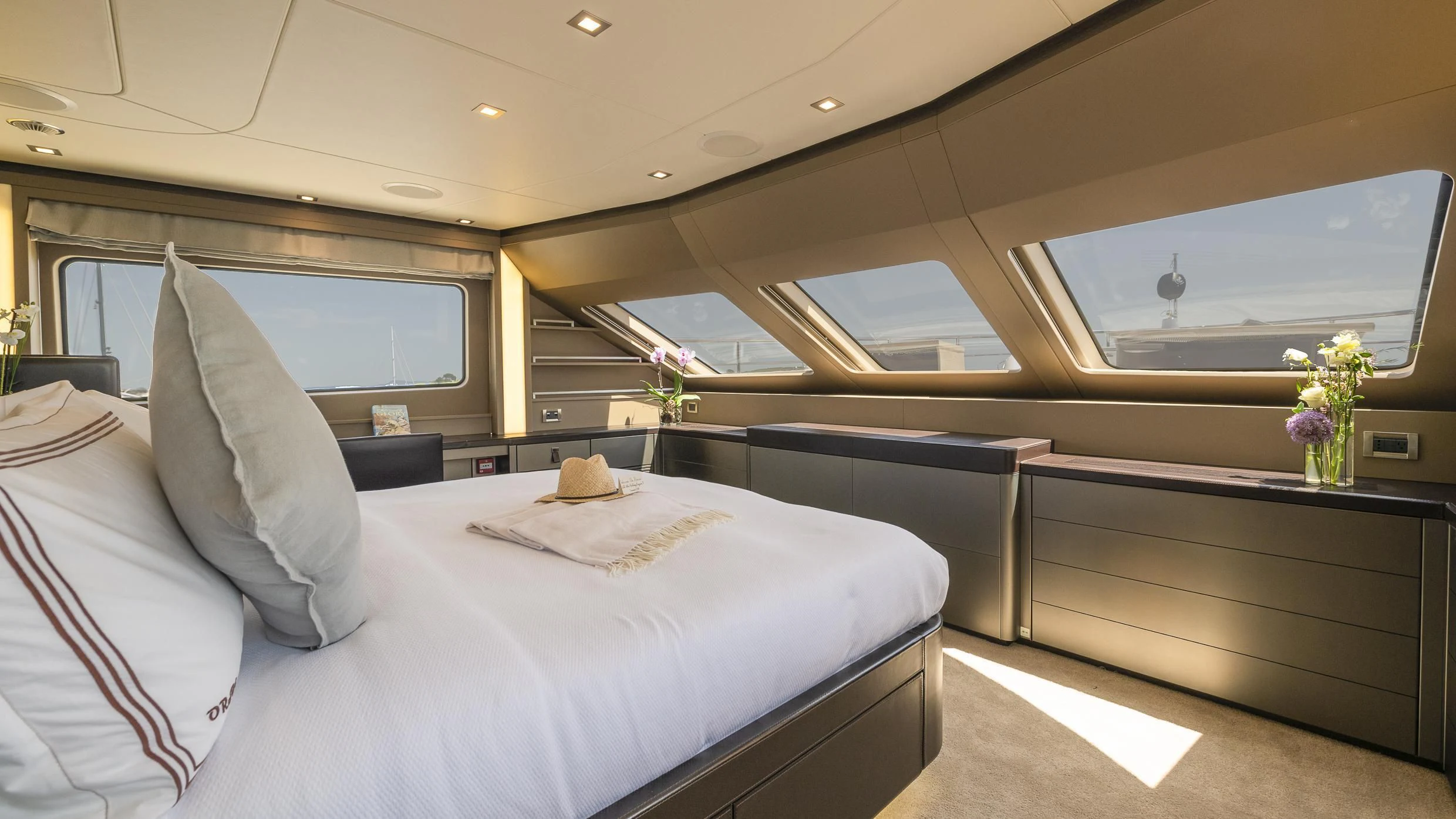 a room with a bed and a window aboard ORSO 3 Yacht for Sale