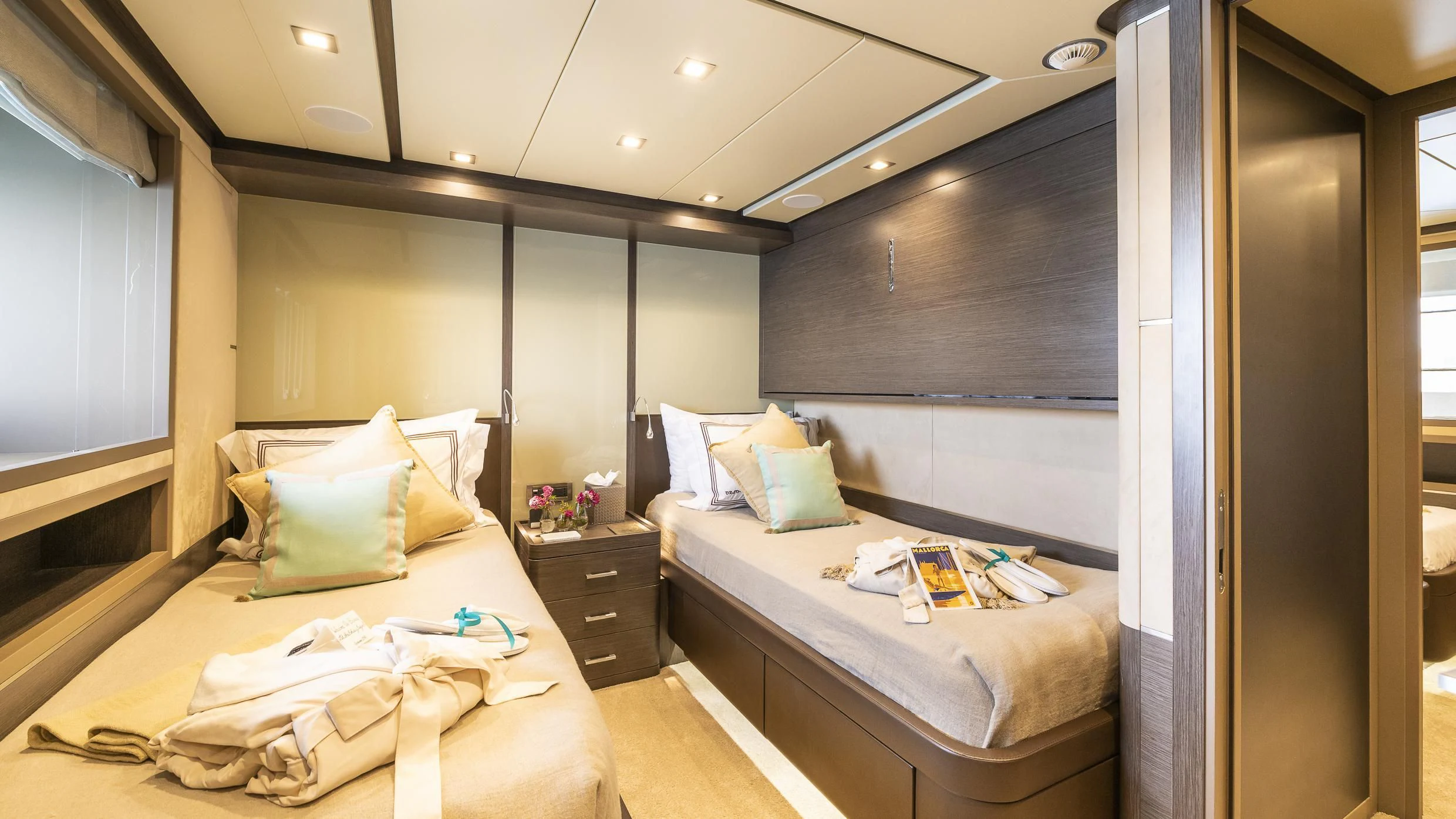 a room with a bed and a desk aboard ORSO 3 Yacht for Sale