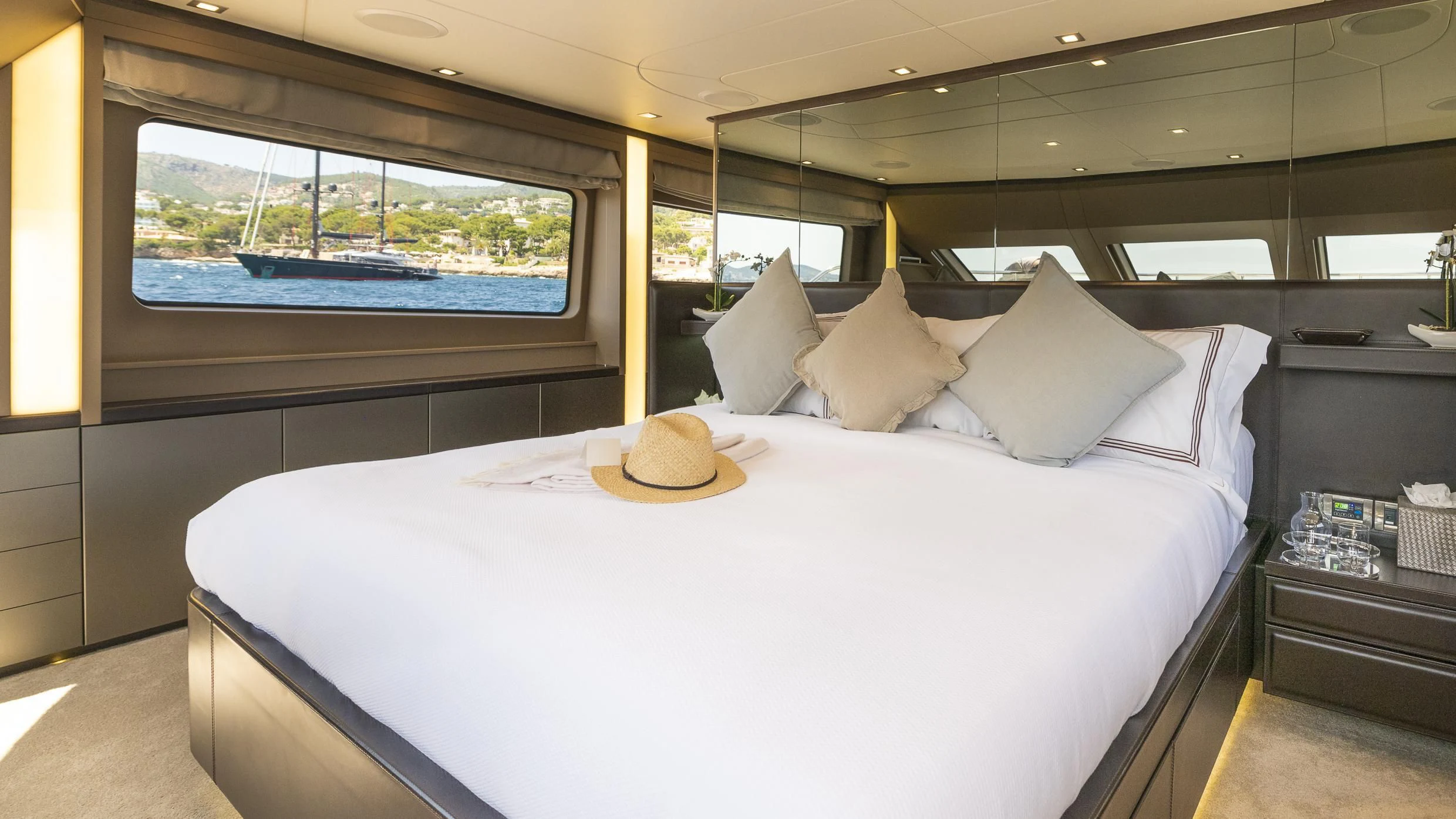 a bed with pillows aboard ORSO 3 Yacht for Sale