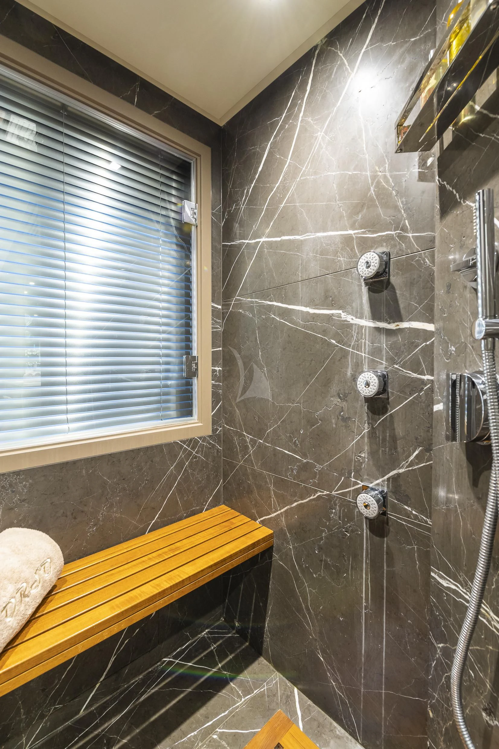 a shower with a shower curtain aboard ORSO 3 Yacht for Sale