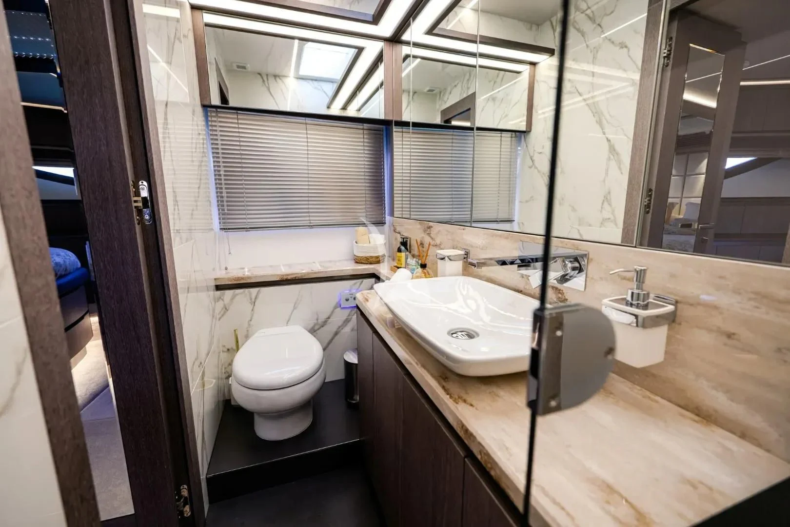 a bathroom with a sink and toilet aboard FG STAR Yacht for Charter