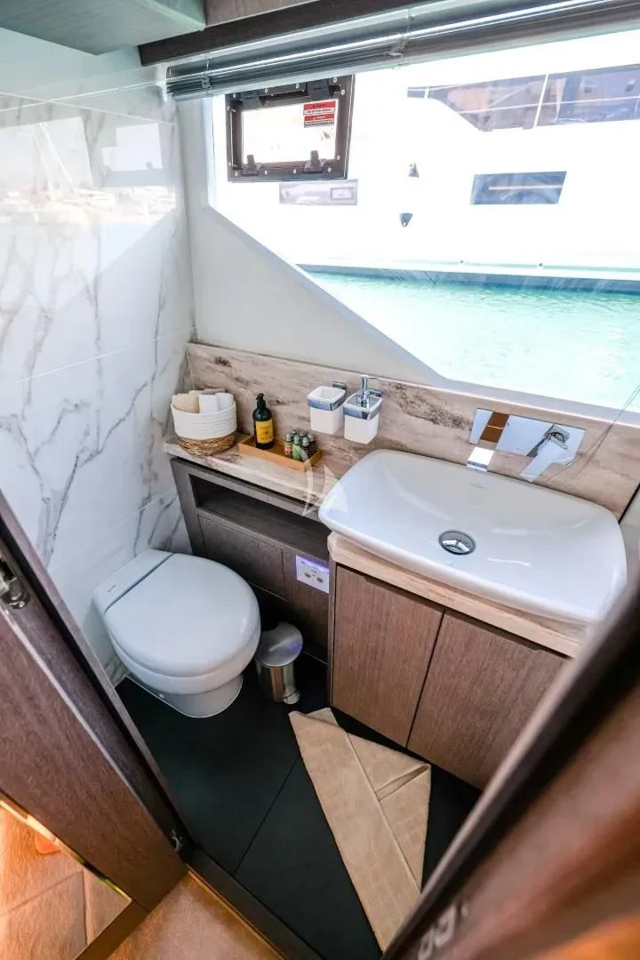 a bathroom with a sink and a toilet aboard FG STAR Yacht for Charter