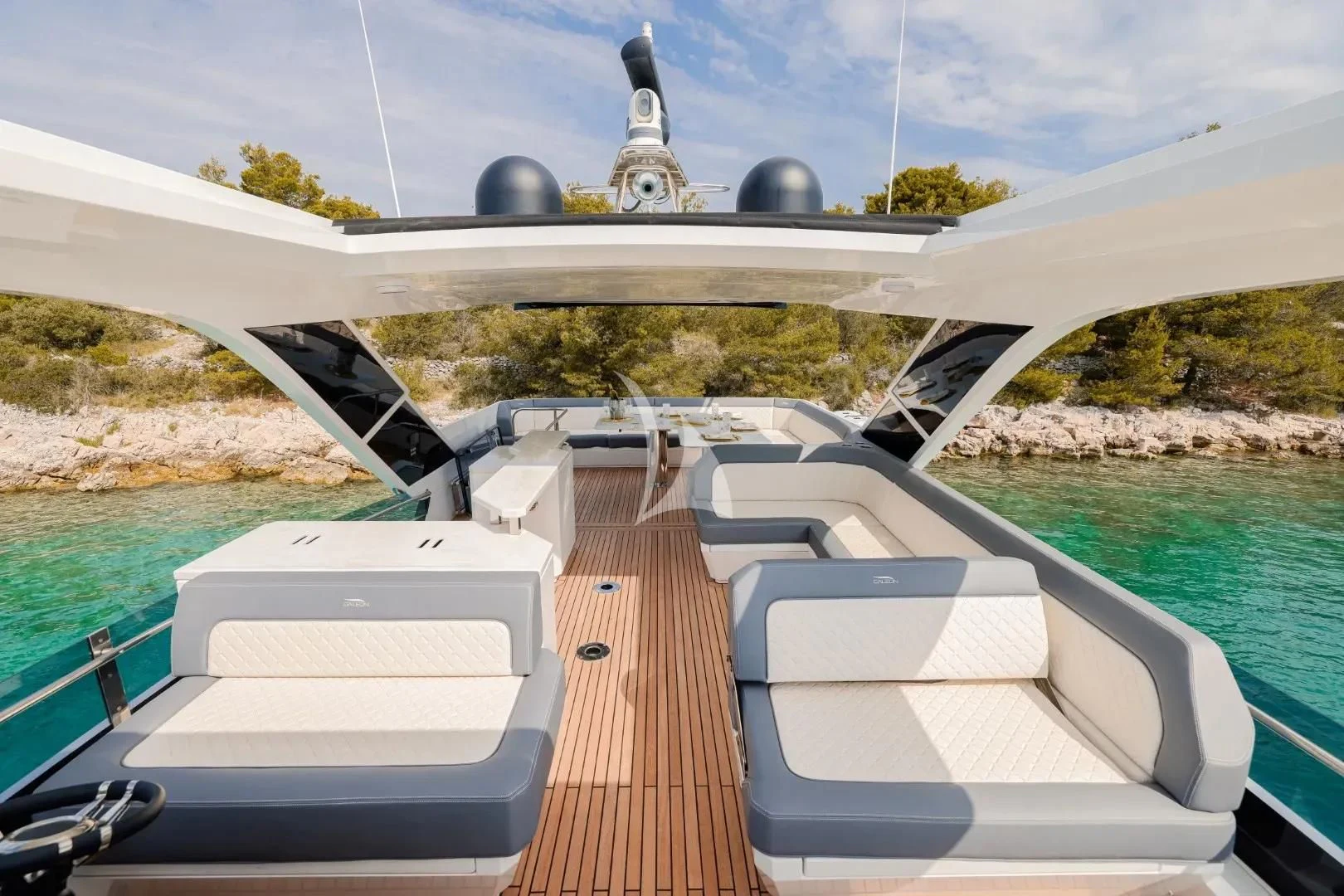 a deck with a deck and a large building with a dome and a dome on top aboard FG STAR Yacht for Charter
