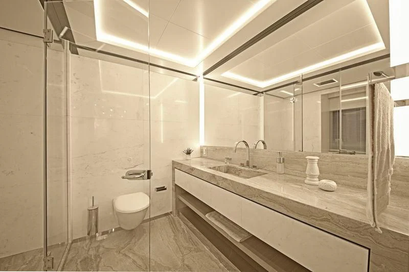 a bathroom with a tub sink and toilet aboard ICE 68 Yacht for Sale