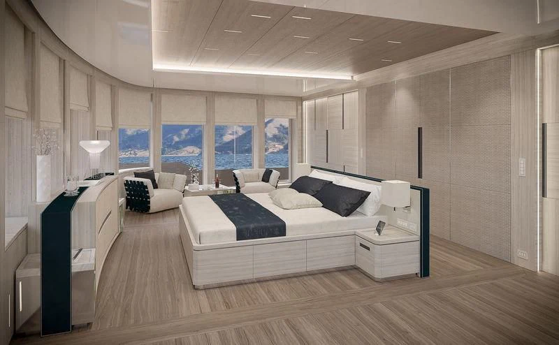 a large room with a bed and a desk aboard ICE 68 Yacht for Sale