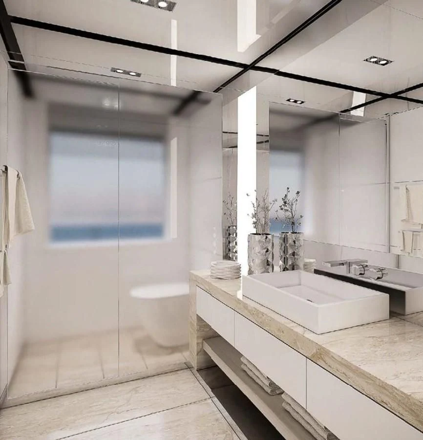 a bathroom with a large mirror aboard ICE 68 Yacht for Sale