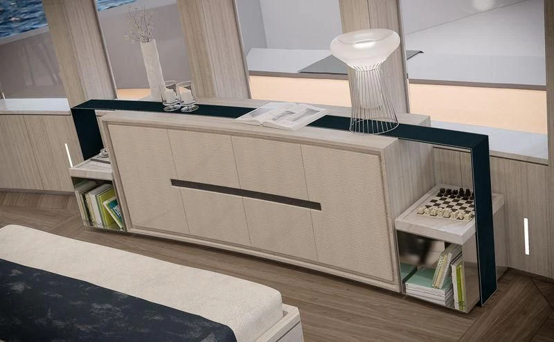 a desk with a lamp and a bookcase aboard ICE 68 Yacht for Sale