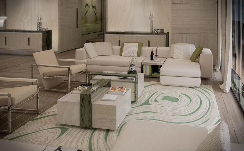 a living room with a white couch and a coffee table aboard ICE 68 Yacht for Sale