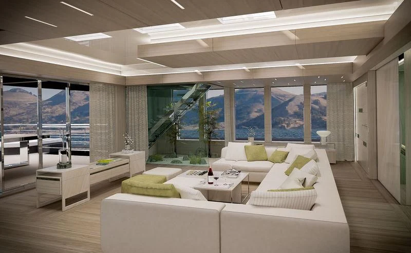 a room with a couch and a table and a window aboard ICE 68 Yacht for Sale