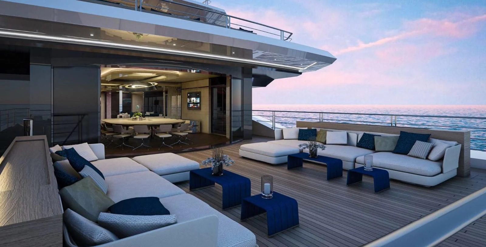 a room with a couch and a table and a large body of water aboard ICE 68 Yacht for Sale