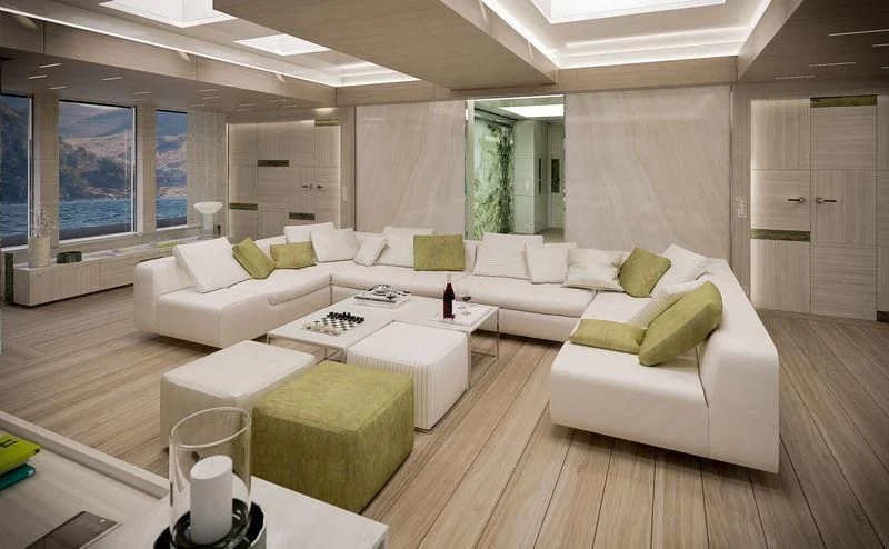 a living room with white couches aboard ICE 68 Yacht for Sale