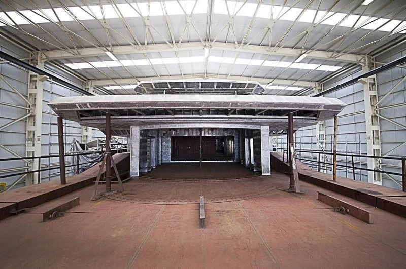 a large room with a large open space aboard ICE 68 Yacht for Sale