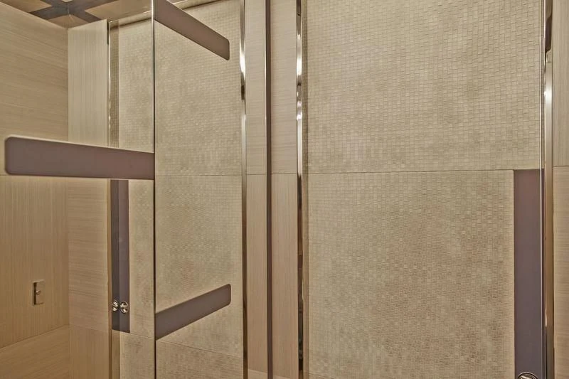 a room with a door and a glass window aboard ICE 68 Yacht for Sale