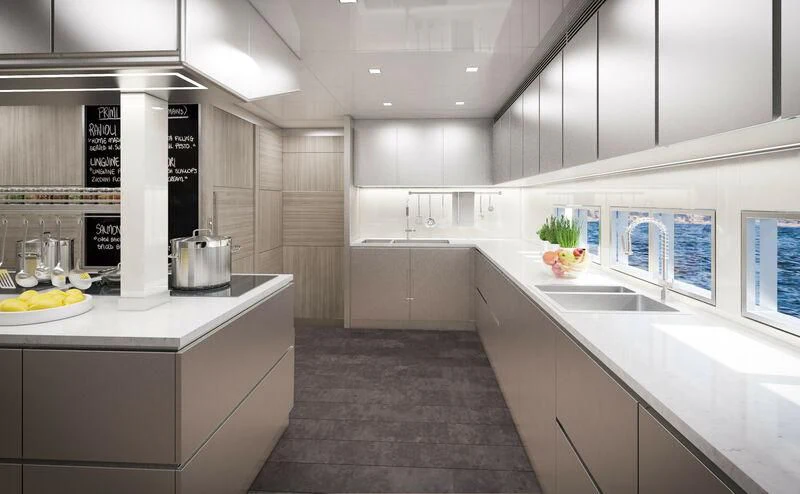 a kitchen with white cabinets aboard ICE 68 Yacht for Sale
