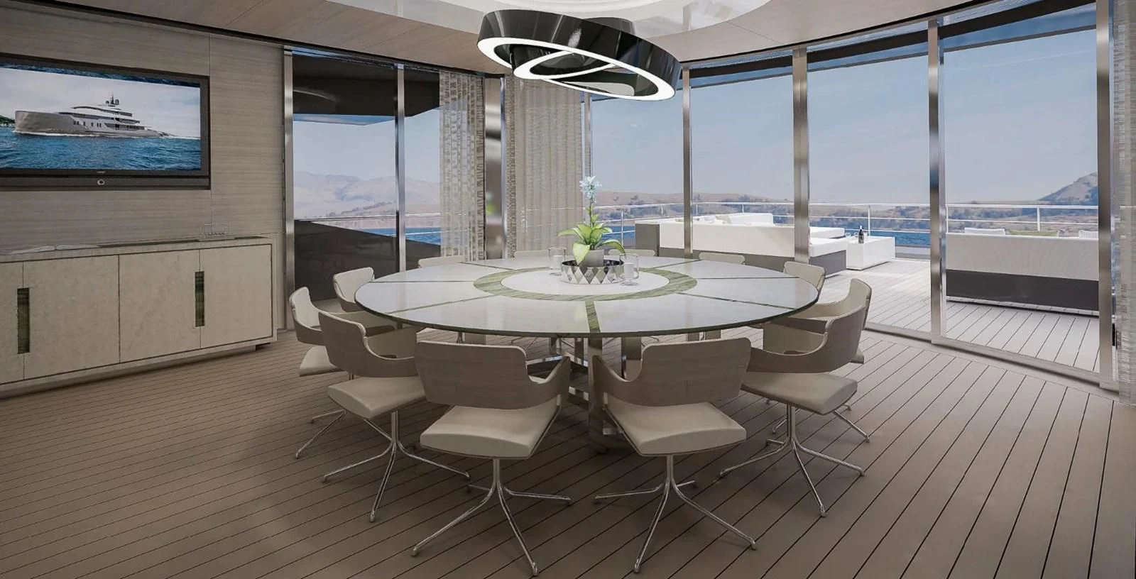 a room with a table and chairs aboard ICE 68 Yacht for Sale