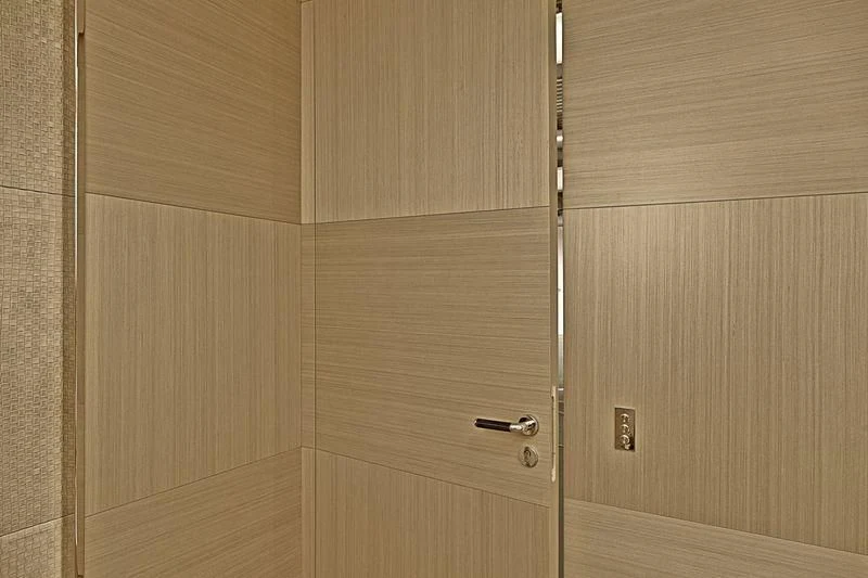 a wooden door with a handle aboard ICE 68 Yacht for Sale