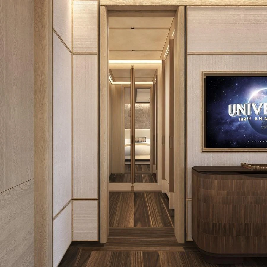 a hallway with a television on the wall aboard ICE 68 Yacht for Sale