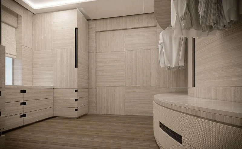 a room with a wood floor and a white wall with white curtains aboard ICE 68 Yacht for Sale