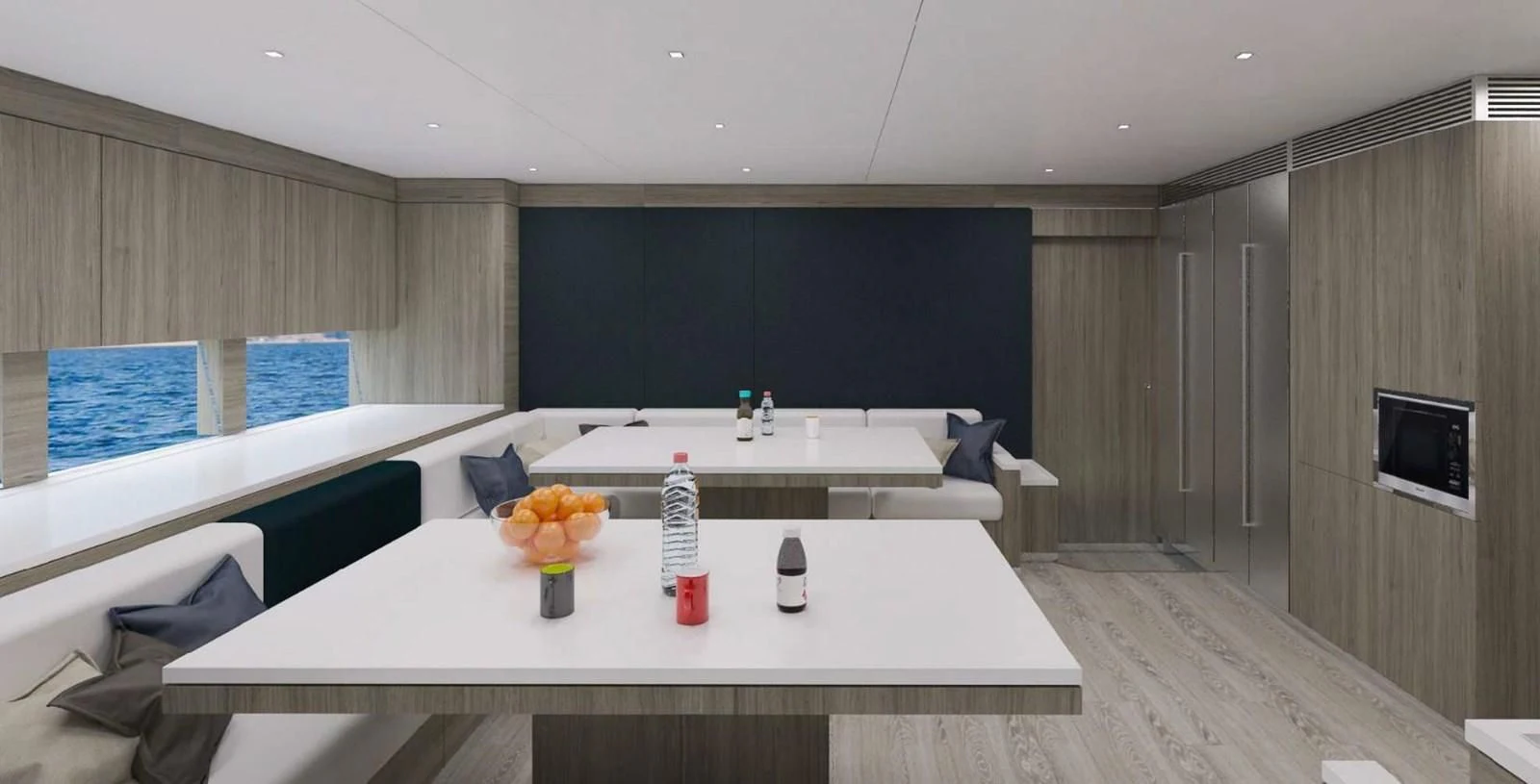 a room with a table and chairs aboard ICE 68 Yacht for Sale