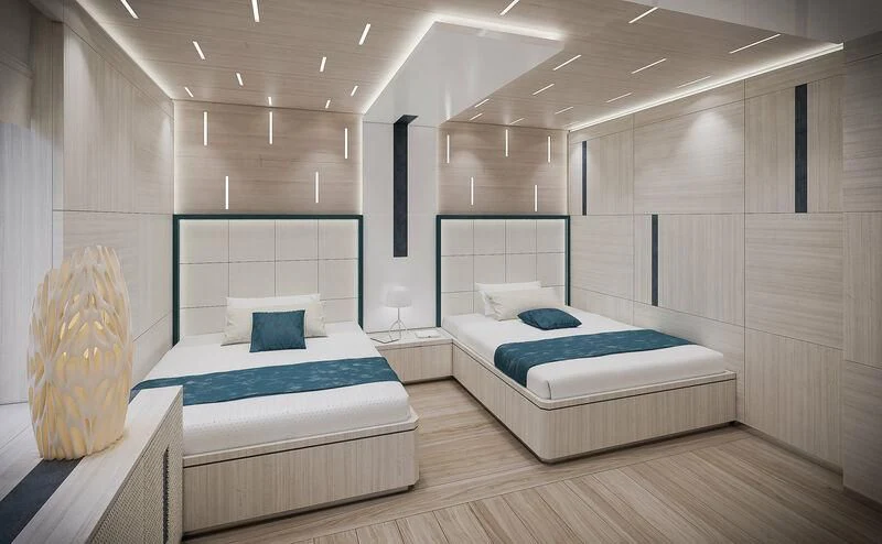 a room with two beds aboard ICE 68 Yacht for Sale