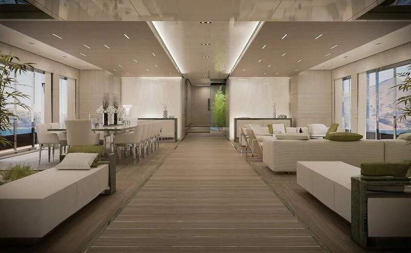 a large room with a long row of couches and tables aboard ICE 68 Yacht for Sale