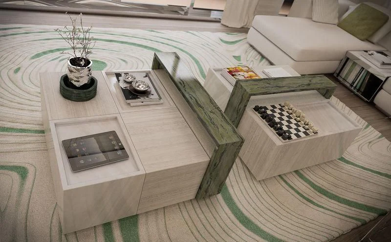 a room with a couch and a table with objects on it aboard ICE 68 Yacht for Sale