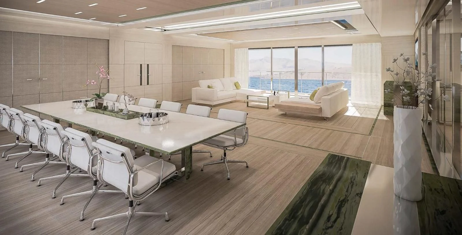 a large room with tables and chairs aboard ICE 68 Yacht for Sale